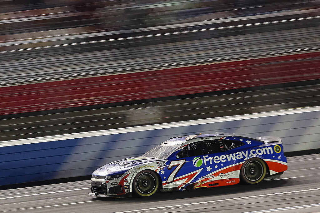 Suarez wins emotional, rain-shortened Coca-Cola 600