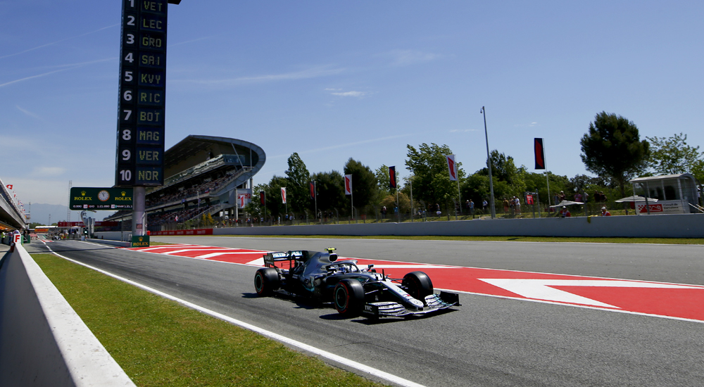 Bottas leads Ferraris in Spain as Stroll crashes