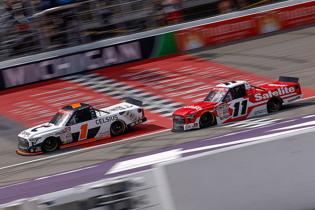 Heim holds off Honeycutt to win Truck race at Michigan