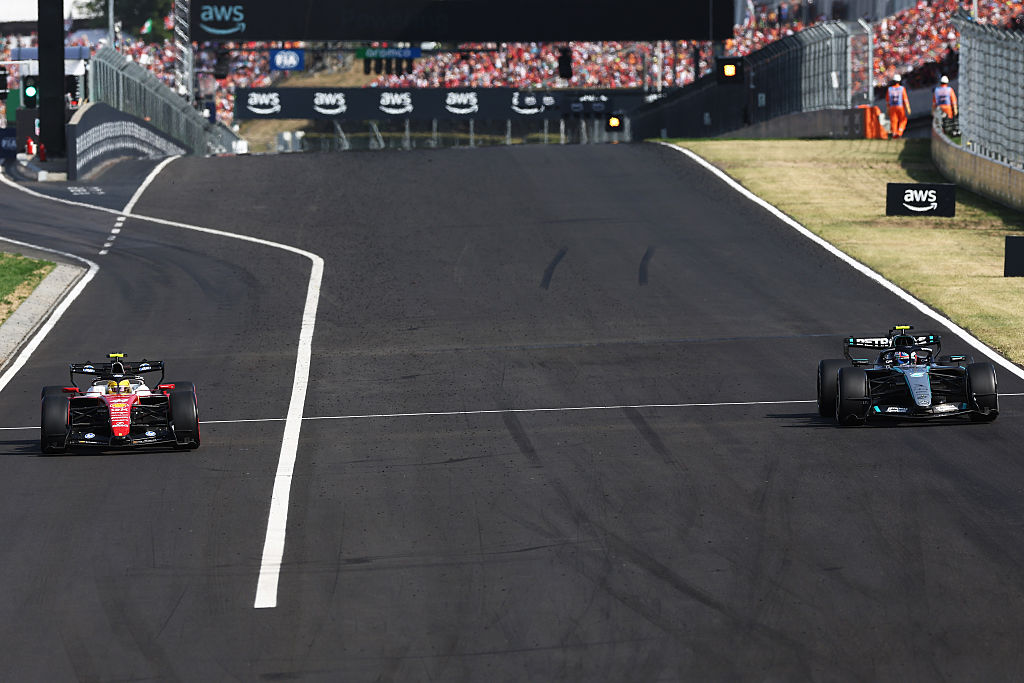 Hamilton questions late pit stop as podium slips away
