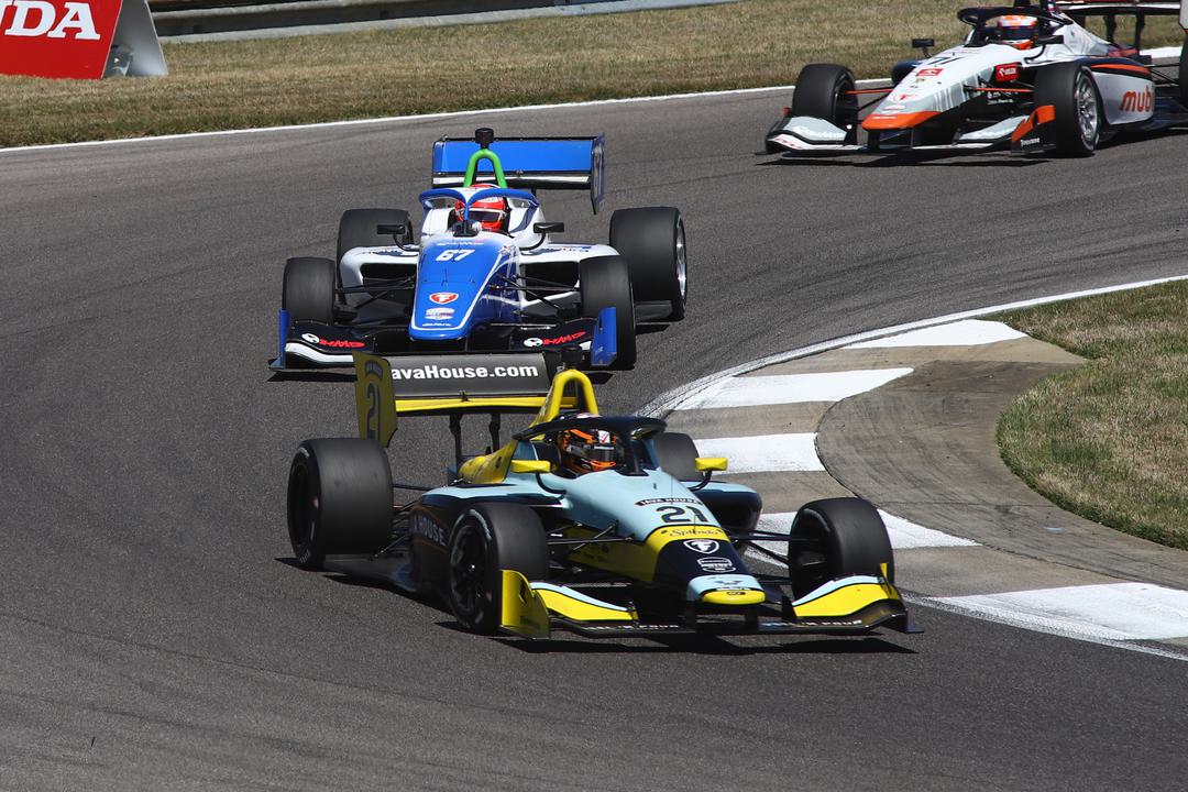 Johnson dodges leaders’ mayhem to win NXT Race 1 at Barber