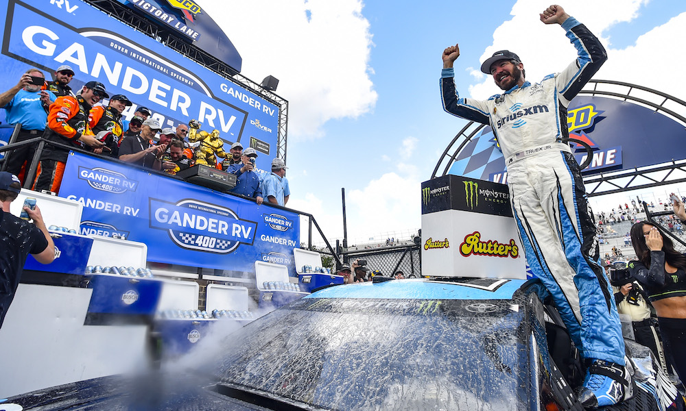 Truex wins rain-delayed Dover